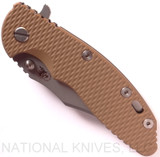 Rick Hinderer Knives XM-18 3.5" Bowie folding knife with thumb stud and flipper tab - shown closed presentation side.  Working Finish 20CV stainless steel plain edge blade.  Coyote G-10 handle with Battle Bronze titanium lock side.  Model K2032SGW00.