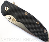 Rick Hinderer Knives XM-18 3.5" Spanto folding knife with thumb stud and flipper tab - shown closed presentation side.  Stonewash S45VN stainless steel plain edge blade.  Black G-10 handle with stonewash bronze lock side.  Model K2002SGS00.