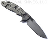 Rick Hinderer Knives XM-18 3.5" Spanto folding knife with thumb stud and flipper tab - shown open lock side.  Working Finish S45VN stainless steel plain edge blade.  OD green G-10 handle with Working Finish lock side.  Model KXM35SPA.