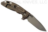 Rick Hinderer Knives XM-18 3.5" Spanto folding knife with thumb stud and flipper tab - shown open lock side.  Working Finish S45VN stainless steel plain edge blade.  FDE G-10 handle with Battle Bronze lock side.  Model K2002SGW00.