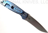 Rick Hinderer Knives Firetac Recurve folding knife with thumb disk - shown open lock side.  Stonewash 20CV stainless steel plain edge blade.  Blue G-10 handle with stonewash blue lock side.  Model K205FSGS00.
