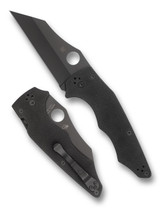 Spyderco Yojumbo folding knife with thumb hole - shown open presentation side and closed pocket clip side.  Black S30V stainless steel plain edge blade.  Black G-10 handle.  Model C253GPBBK.