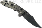 Rick Hinderer Knives XM-18 3.5" Bowie folding knife with thumb stud and flipper tab - shown open lock side.  Battle Black 20CV stainless steel plain edge blade.  OD green - black G-10 handle with Battle Black titanium lock side.  Model K20320SNNC.