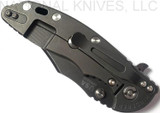 Rick Hinderer Knives XM-18 3.5" Bowie folding knife with thumb stud and flipper tab - shown closed lock side.  Battle Black 20CV stainless steel plain edge blade.  OD green - black G-10 handle with Battle Black titanium lock side.  Model K20320SNNC.
