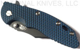 Rick Hinderer Knives XM-18 3.5" Bowie folding knife with thumb stud and flipper tab - shown closed presentation side.  Battle Black 20CV stainless steel plain edge blade.  Blue - black G-10 handle with Battle Black titanium lock side.  Model K20320SNNC.
