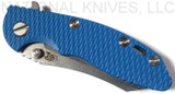 Rick Hinderer Knives XM-18 3.0" Skinner folding knife with thumb studs and flipper tab - shown closed presentation side.  Stonewashed 20CV stainless steel plain edge blade.  Blue G-10 handle with stonewashed blue lock side.  Model K1041SGS00.