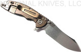 Rick Hinderer Knives XM-18 3.0" Skinner folding knife with thumb studs and flipper tab - shown open lock side.  Stonewashed 20CV stainless steel plain edge blade.  OD green G-10 handle with stonewashed bronze lock side.  Model K1041SGS00.