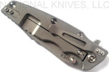 Rick Hinderer Knives Eklipse Harpoon Spanto folding knife with thumb stud and flipper tab - shown closed lock side.  Working Finish 20CV stainless steel plain edge blade.  Blue - black G-10 handle with Working Finish lock side.  Model K40442SGW00.