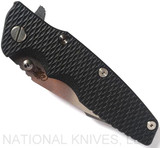 Rick Hinderer Knives Eklipse Harpoon Spanto folding knife with thumb stud and flipper tab - shown closed presentation side.  Stonewash 20CV stainless steel plain edge blade.  Black G-10 handle with stonewash bronze lock side.  Model K40442SGS00.