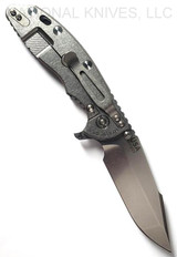 Rick Hinderer Knives Skinny XM-18 3.5" Harpoon Spanto folding knife with thumb stud and flipper tab - shown open lock side.  Stonewash 20CV stainless steel plain edge blade.  Black G-10 handle with stonewash lock side.  Model K2555SGS00.