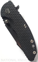 Rick Hinderer Knives Skinny XM-18 3.5" Harpoon Spanto folding knife with thumb stud and flipper tab - shown closed presentation side.  Stonewash 20CV stainless steel plain edge blade.  Black G-10 handle with stonewash lock side.  Model K2555SGS00.