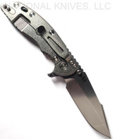 Rick Hinderer Knives Skinny XM-18 3.5" Harpoon Spanto folding knife with thumb stud and flipper tab - shown open lock side.  Stonewash 20CV stainless steel plain edge blade.  OD green G-10 handle with stonewash lock side.  Model K2555SGS00.