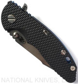 Rick Hinderer Knives Skinny XM-18 3.5" Harpoon Spanto folding knife with thumb stud and flipper tab - shown closed presentation side.  Stonewash 20CV stainless steel plain edge blade.  Black G-10 handle with stonewash blue lock side.  Model K2555SGS00.