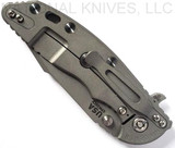 Rick Hinderer Knives Skinny XM-18 3.5" Harpoon Spanto folding knife with thumb stud and flipper tab - shown closed lock side.  Working Finish 20CV stainless steel plain edge blade.  Coyote G-10 handle with Working Finish lock side.  Model K2555SGW00.