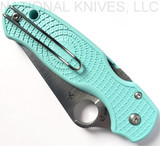 Spyderco Para 3 MGE Exclusive folding knife with thumb hole - shown closed pocket clip side.  Satin S90V stainless steel plain edge blade.  Teal FRN handle.  Model C223PTBL.
For reference only.