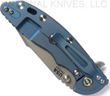 Rick Hinderer Knives Skinny XM-18 3.5" Harpoon Spanto folding knife with thumb stud and flipper tab - shown closed lock side.  Working Finish 20CV stainless steel plain edge blade.  Blue G-10 handle with Battle Blue lock side.  Model K2555SGW00.