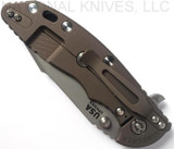 Rick Hinderer Knives Skinny XM-18 3.5" Harpoon Spanto folding knife with thumb stud and flipper tab - shown closed lock side.  Working Finish 20CV stainless steel plain edge blade.  OD green G-10 handle with Battle Bronze lock side.  Model K2555SGW00.