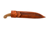 Condor Tool and Knife Primitive Bush Mondo fixed blade knife - shown in sheath obverse.  1075 steel plain edge blade.  Micarta handle.  Model CTK3924-9.9.
For reference only.