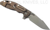 Rick Hinderer Knives Skinny XM-18 3.5" Harpoon Spanto folding knife with thumb stud and flipper tab - shown open lock side.  Working Finish 20CV stainless steel plain edge blade.  Black G-10 handle with Battle Bronze lock side.  Model K2555SGW00.