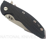 Rick Hinderer Knives Skinny XM-18 3.5" Harpoon Spanto folding knife with thumb stud and flipper tab - shown closed presentation side.  Working Finish 20CV stainless steel plain edge blade.  Black G-10 handle with Battle Bronze lock side.  Model K2555SGW00.