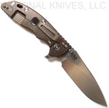 Rick Hinderer Knives XM-18 3.5" Slicer folding knife with thumb stud and flipper tab - shown open lock side.  Stonewash 20CV stainless steel plain edge blade.  Coyote G-10 handle with stonewash bronze lock side.  Model K310102S000.