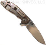 Rick Hinderer Knives XM-18 3.5" Slicer folding knife with thumb stud and flipper tab - shown open lock side.  Stonewash 20CV stainless steel plain edge blade.  OD green G-10 handle with stonewash bronze lock side.  Model K310102S000.