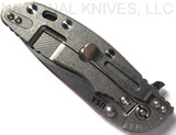 Rick Hinderer Knives XM-18 3.5" Slicer folding knife with thumb stud and flipper tab - shown closed lock side.  Stonewash 20CV stainless steel plain edge blade.  Grey G-10 handle with stonewash titanium lock side.  Model K2012SGS00.