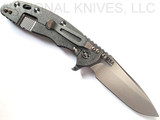 Rick Hinderer Knives XM-18 3.5" Spear Point folding knife with thumb stud and flipper tab - shown open lock side.  Stonewash 20CV stainless steel plain edge blade.  Blue G-10 handle with stonewash lock side.  Model KXM35SPE.