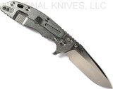 Rick Hinderer Knives XM-18 3.5" Spear Point folding knife with thumb stud and flipper tab - shown open lock side.  Stonewash 20CV stainless steel plain edge blade.  Blue - black G-10 handle with stonewash lock side.  Model KXM35SPE.
