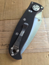 Used Spyderco Autonomy 2 automatic knife with button blade release - shown closed pocket clip side.  Satin LC200N plain edge blade.  Black G-10 handle.  Model C165GP2.
