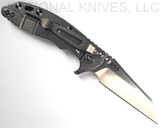 Rick Hinderer Knives XM-18 3.0" Wharncliffe folding knife with thumb stud and flipper tab - shown open lock side.  Stonewash 20CV stainless steel plain edge blade.  OD green G-10 handle with stonewash lock side.  Model KXM3000WC.