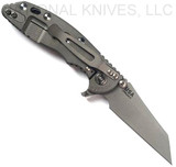 Rick Hinderer Knives XM-18 3.0" Wharncliffe folding knife with thumb stud and flipper tab - shown open lock side.  Working Finish 20CV stainless steel plain edge blade.  OD Green G-10 handle with Working Finish lock side.  Model KXM3000WC.
