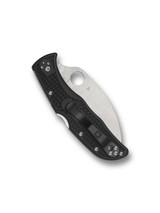 Spyderco Endela folding knife with thumb hole - shown closed pocket clip side.  Satin VG-10 stainless steel, wharncliffe, serrated edge blade.  Black FRN handle.  Model C243FSWCBK.