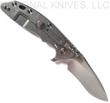 Rick Hinderer Knives XM-18 3.5" Recurve folding knife with thumb stud and flipper tab - shown open lock side.  Stonewash 20CV stainless steel plain edge blade.  Black G-10 handle with stonewash lock side.  Model KXM35REC.