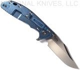 Rick Hinderer Knives XM-24 Bowie folding knife with thumb stud and flipper tab - shown open lock side.  Stonewash 20CV stainless steel plain edge blade.  Black G-10 handle with stonewash blue lock side.  Model KXM40BO.