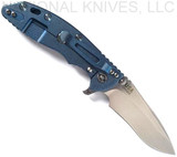 Rick Hinderer Knives XM-18 3.5" Recurve folding knife with thumb stud and flipper tab - shown open lock side.  Stonewash 20CV stainless steel plain edge blade.  Blue - black G-10 handle with stonewash blue lock side.  Model KXM35REC.