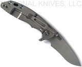 Rick Hinderer Knives XM-18 3.5" Recurve folding knife with thumb stud and flipper tab - shown open lock side.  Working Finish 20CV stainless steel plain edge blade.  Black G-10 handle with Working Finish lock side.  Model KXM35REC.