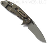 Rick Hinderer Knives XM-18 3.5" Recurve folding knife with thumb stud and flipper tab - shown open lock side.  Working Finish 20CV stainless steel plain edge blade.  OD green G-10 handle with Battle Bronze lock side.  Model KXM35REC.