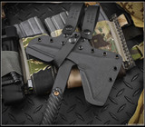 RMJ Tactical Ragnarok 14 tomahawk - shown close up of head in sheath obverse.  Black Cerakote 80CRV2 steel plain edge head.  Black G-10 handle.  Model R14-BLK-BL.