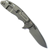 Rick Hinderer Knives XM-18 3.5" Spanto folding knife with thumb stud and flipper tab - shown open lock side.  Working Finish S45VN stainless steel plain edge blade.  Translucent Green G-10 handle with Working Finish lock side.  Model KXM35SPA.