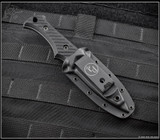 RMJ Tactical Tracker Dan Set - Bloodshark fixed blade knife shown in sheath reverse.   Cobalt Cerakote 80CRV2 steel plain head (tomahawk) and Cobalt Cerakote Nitro-V stainless steel plain edge blade (knife).  Black Linen Micarta handle.
For reference only. RMJ Tactical Tracker Dan Set - Bloodshark fixed blade knife shown in sheath reverse.   Cobalt Cerakote 80CRV2 steel plain head (tomahawk) and Cobalt Cerakote Nitro-V stainless steel plain edge blade (knife).  Black Linen Micarta handle.
For reference only.
