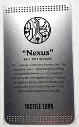 Tactile Turn Seasonal Release Nexus Side Click ink pen - shown metal card obverse.  Nexus themed titanium construction.  Standard length.
For reference only.