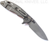 Rick Hinderer Knives Skinny XM-18 3.5" Slicer folding knife with thumb stud and flipper tab - shown open lock side.  Working Finish MagnaCut stainless steel plain edge blade.  Red G-10 handle with Working Finish lock side.  Model KXM35SKSL.