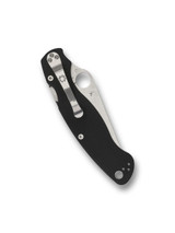 Spyderco Military 2 folding knife with thumb hole - shown closed pocket clip side.  Satin S30V stainless steel serrated edge blade.  Black G-10 handle.  Model C36GS2.