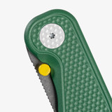 Tactile Knife Co Seasonal Release Fairway Rockwall folding knife with a thumb stud - close up of pivot and thumb stud.  Stonewashed MagnaCut stainless steel plain edge blade.  Green coated titanium handle.  Model 20-RT-MCFW-TTFW.