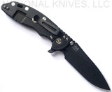 Rick Hinderer Knives Skinny XM-18 3.5" Slicer folding knife with thumb stud and flipper tab - shown open lock side.  Battle Black MagnaCut stainless steel plain edge blade.  OD green G-10 handle with Battle Black lock side.  Model KXM35SKSLDLC.