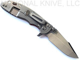 Rick Hinderer Knives XM-18 3.5" Harpoon Spanto folding knife with thumb stud and flipper tab - shown open lock side.  Stonewash S45VN stainless steel plain edge blade.  Red G-10 handle with stonewash lock side.  Model KXM35HS.