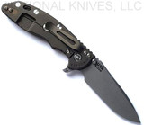 Rick Hinderer Knives XM-18 3.5" Spear Point folding knife with thumb stud and flipper tab - shown open lock side.  Working Finish S45VN stainless steel plain edge blade.  FDE G-10 handle with Battle Bronze lock side.  Model KXM35SPE.