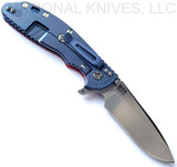 Rick Hinderer Knives XM-24 Spear Point folding knife with thumb stud and flipper tab - shown open lock side.  Stonewash S45VN stainless steel plain edge blade.  Red G-10 handle with stonewash blue lock side.  Model KXM40SPE.