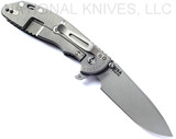 Rick Hinderer Knives XM-24 Spear Point folding knife with thumb stud and flipper tab - shown open lock side.  Working Finish S45VN stainless steel plain edge blade.  Black G-10 handle with Working Finish lock side.  Model KXM40SPE.